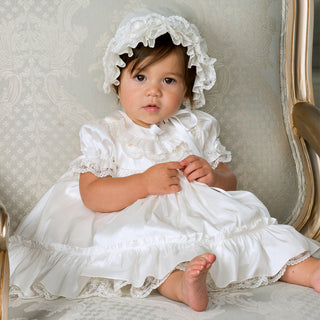 Sarah Louise Dress and Bonnet 001145 Ivory Worn By a Girl